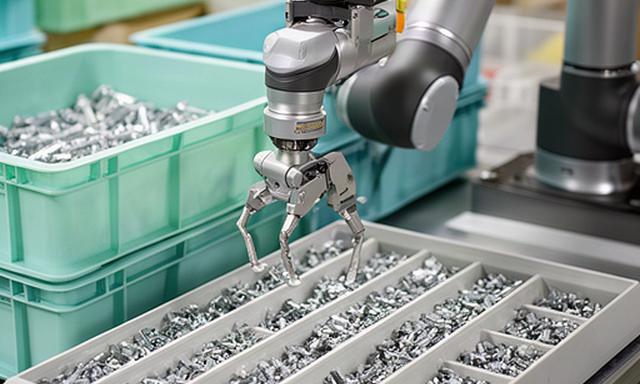 羽曳野市の製造現場で協働ロボットが小型部品をトレーへ整列する様子
